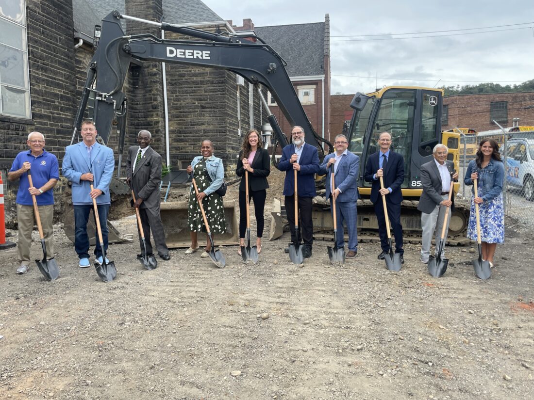 Julie Stenger GROUND BROKEN — City leaders joined board members of the Ohio Valley Youth Network for a groundbreaking at the Sycamore Youth Center Thursday afternoon. Among those helping to get the project started were, from left, Tom Timmons, Kiwanis Club treasurer; Mike Florak, board director; James Baber, Ohio Valley Youth Network board vice president; Cookie West, board director; Bill Holt, Jefferson County Prevention and Recovery Board; Rebekah Cohen Morris, AIM executive director; Jefferson County Commissioner Eric Timmons; Steubenville Mayor Jerry Barilla; Emily Byers, Jefferson County Chamber of Commerce president; and Bobbyjon Bauman, Sycamore Youth Center executive director and OVYN president.